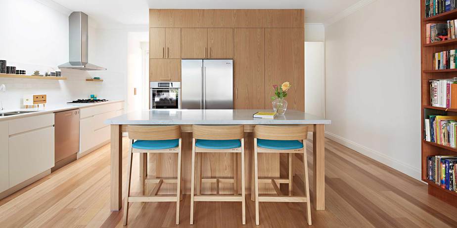 Smarter Bathrooms and Kitchens - a modern kitchen full with wooden floor and furnitures. Beautiful kitchen designs built by kitchen renovations Melbourne specialist