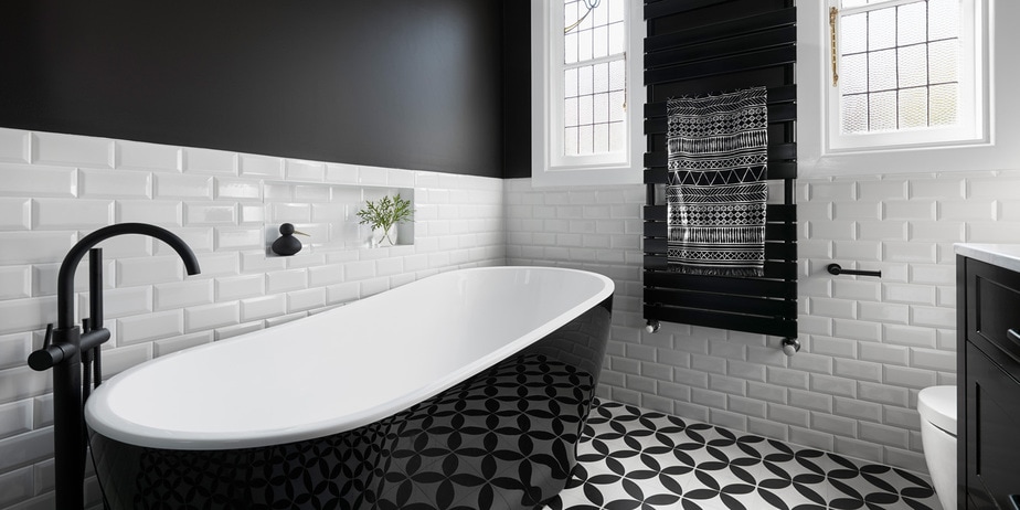 Smarter Bathrooms and Kitchens - a modern bathroom with beautiful tiles and freestand bath designed by bathroom renovations Melbourne specialist